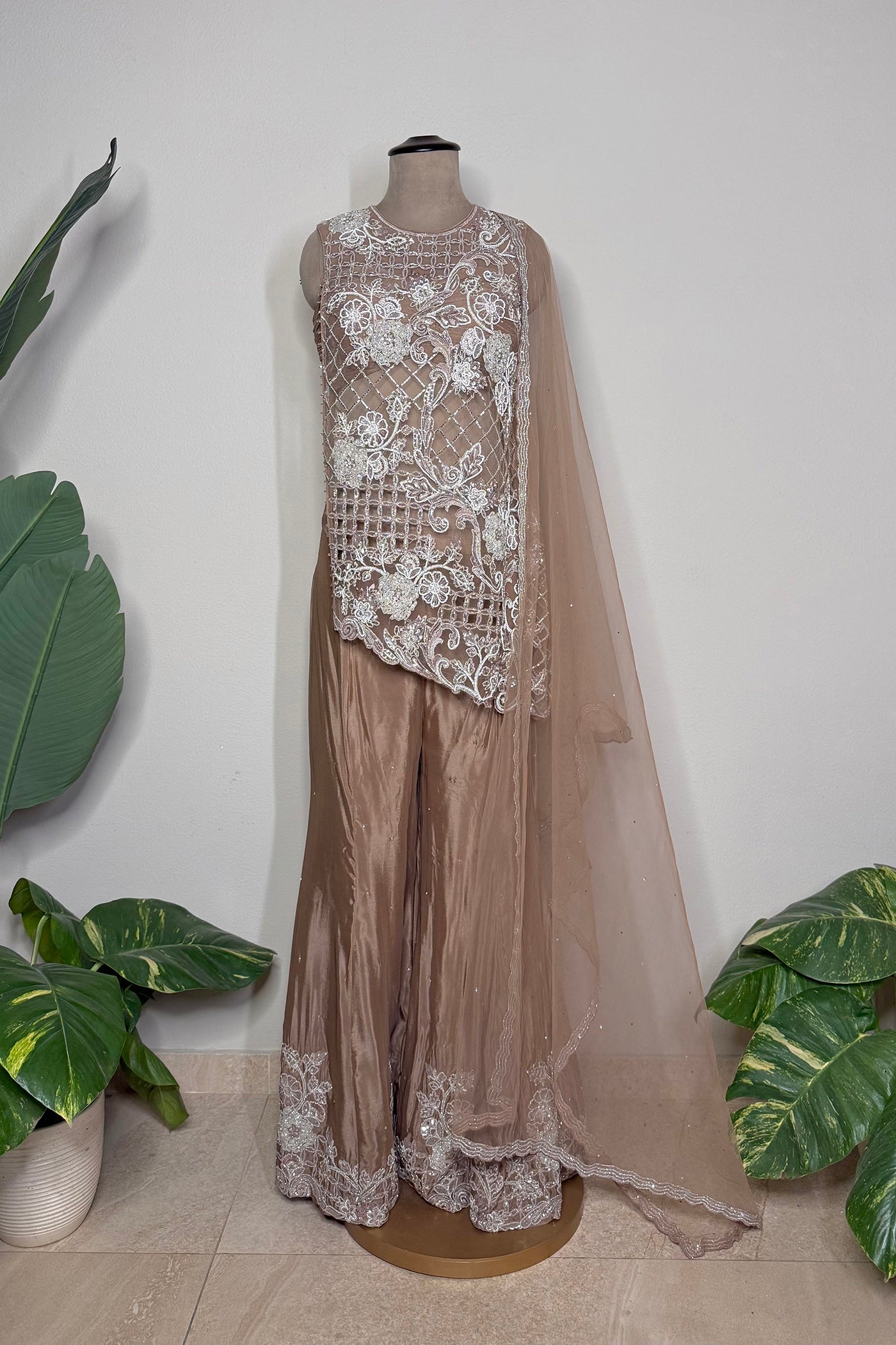 Aishani Asymmetric Kurta Top with Chinnon Palazzo and Net Dupatta