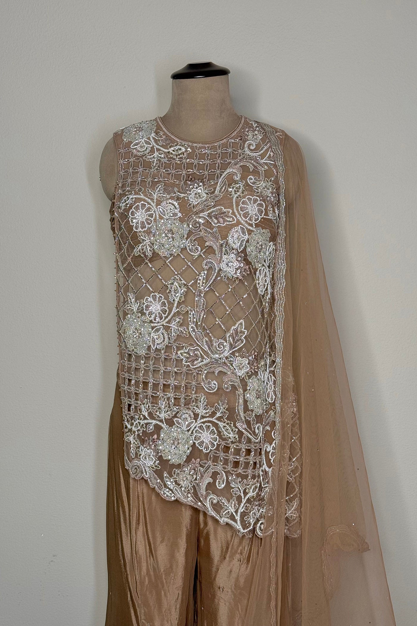 Aishani Asymmetric Kurta Top with Chinnon Palazzo and Net Dupatta