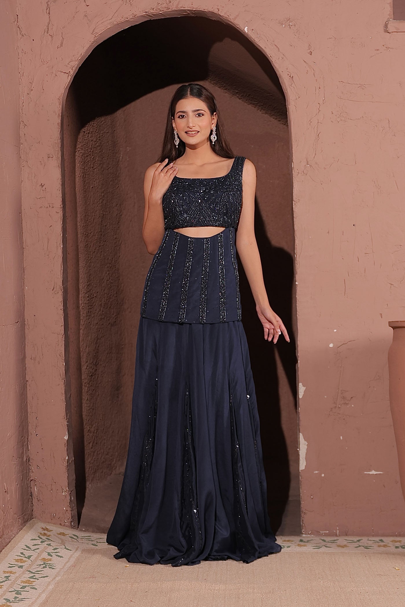 Shadow peplum top with bustier and flared pants