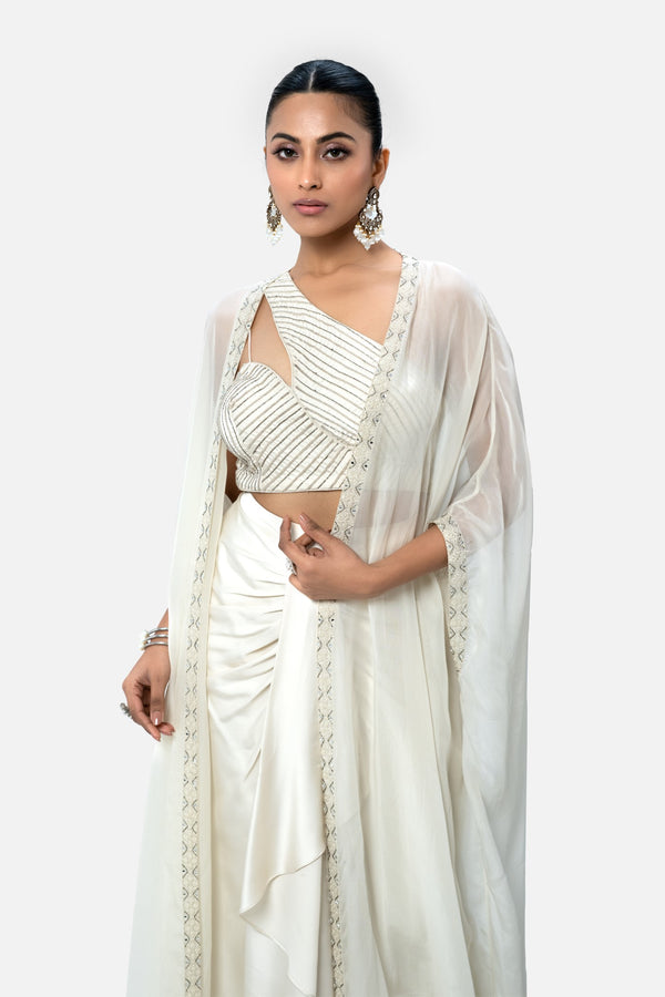 Clara Dhoti And One Shoulder Blouse With Cape